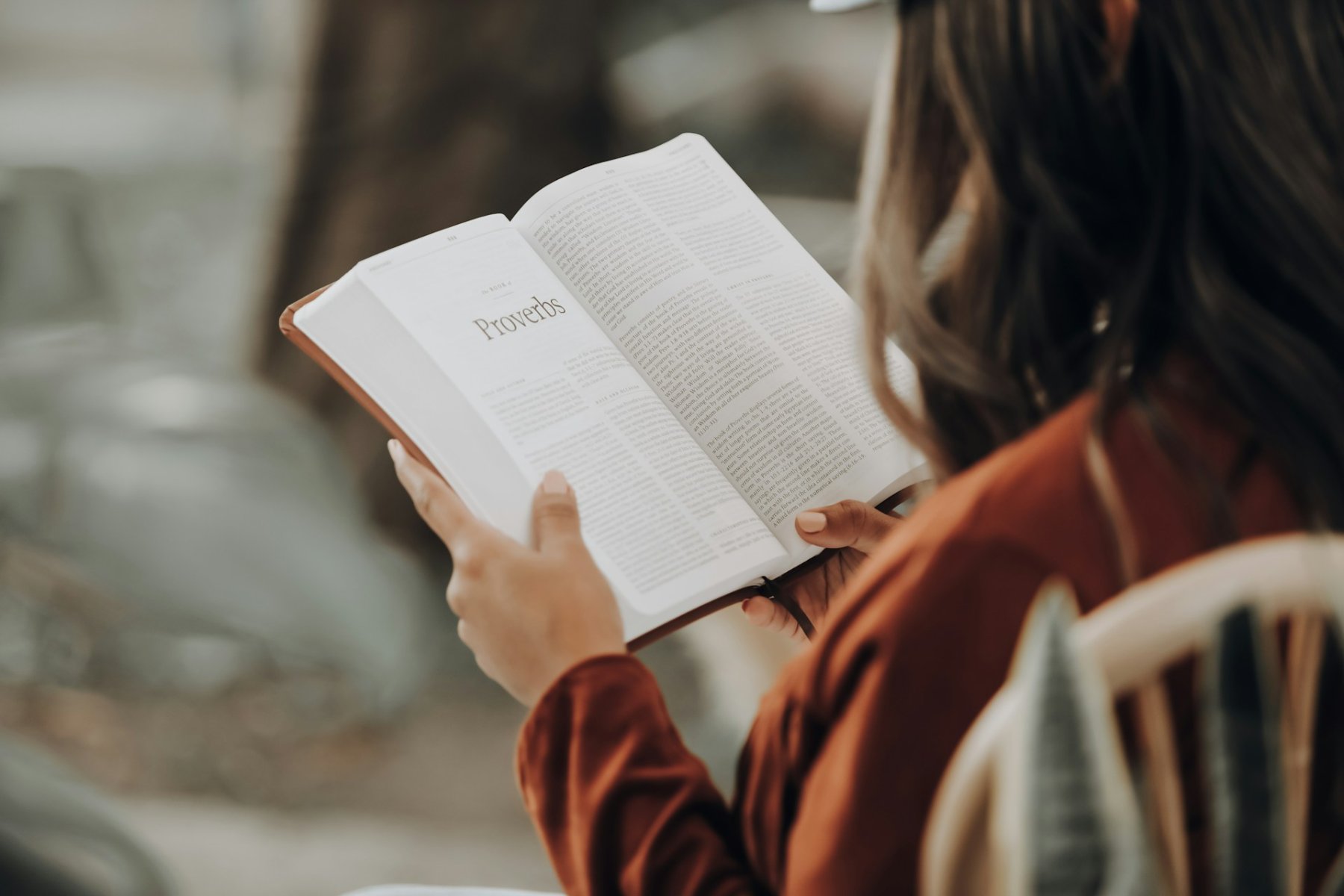 Woman reads a Bible
